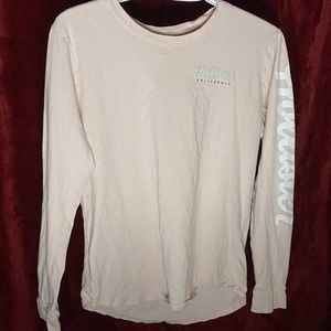 A pink long sleeve t-shirt